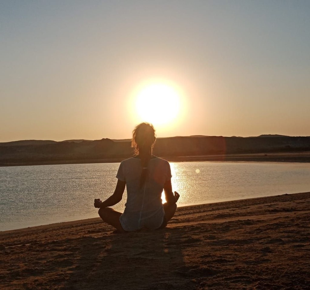 Romana meditating at sunset in Egypt